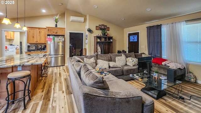 5135 Grange Rd, Roseburg, OR 97471 - living room with a wall mounted air conditioner, light wood finished floors, lofted ceiling, plenty of natural light, and recessed lighting