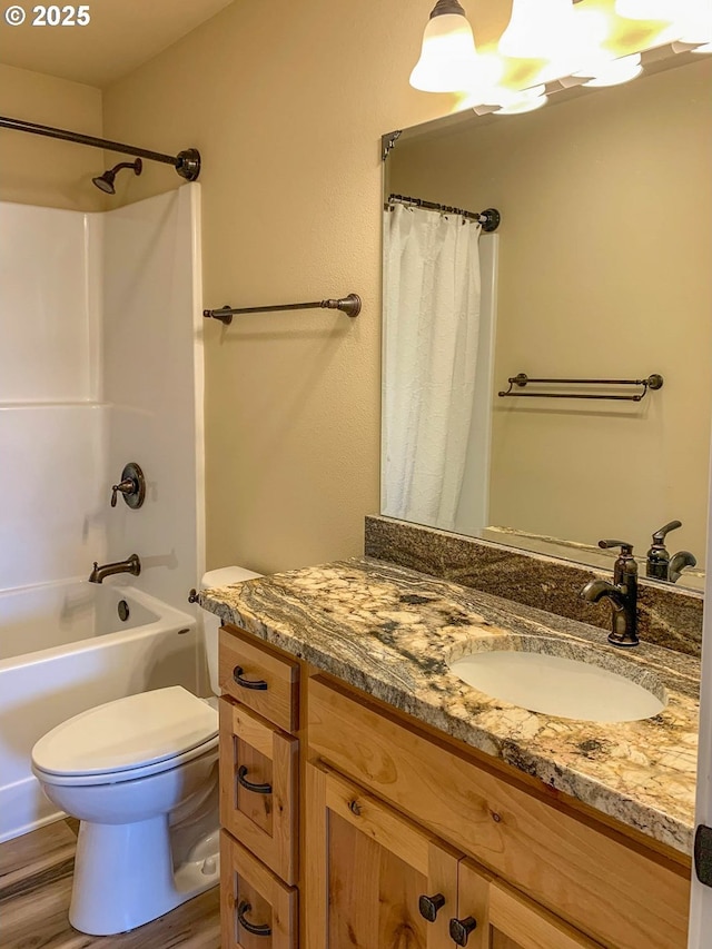 5135 Grange Rd, Roseburg, OR 97471 - bathroom featuring vanity, toilet, shower / bathtub combination with curtain, and wood finished floors