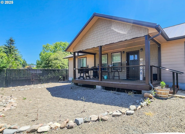 5135 Grange Rd, Roseburg, OR 97471 - back of property with covered porch and metal roof