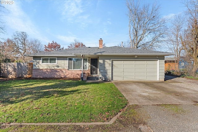 single story home featuring a garage and a front lawn