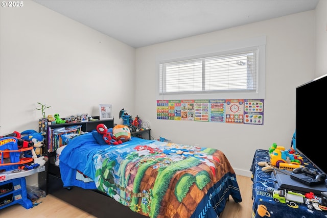 bedroom featuring light hardwood / wood-style floors