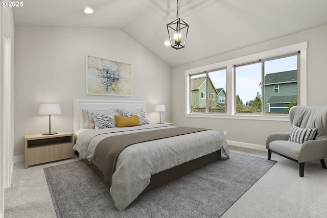 bedroom with lofted ceiling, an inviting chandelier, baseboards, and light colored carpet