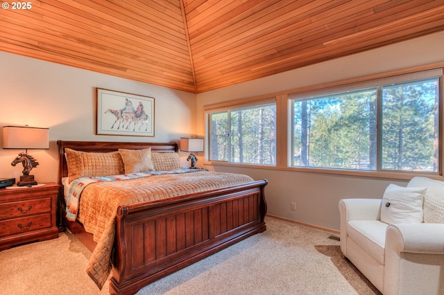 bedroom with wood ceiling, carpet, and baseboards