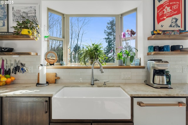 9065 8th St, Bay City, OR 97107 - kitchen featuring open shelves, backsplash, a sink, and light countertops