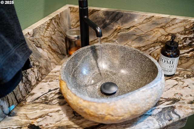 9065 8th St, Bay City, OR 97107 - bathroom view of a sink, a textured wall, and a tub to relax in