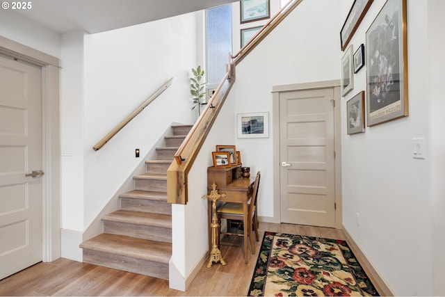 9065 8th St, Bay City, OR 97107 - stairway with wood finished floors and baseboards