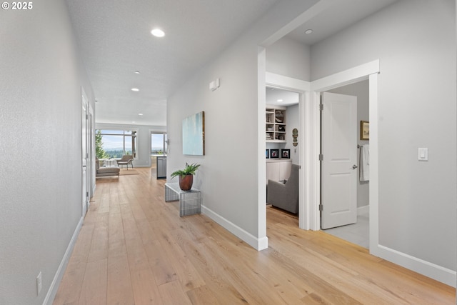 15180 SW Harveys View Ave, Tigard, OR 97224 - hallway with light wood finished floors, recessed lighting, and baseboards