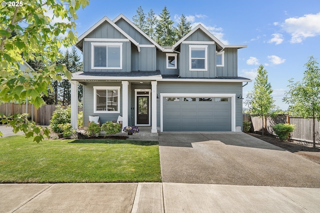 21773 SW Meadow Ter, Sherwood, OR 97140 - view of front of property with concrete driveway, an attached garage, and board and batten siding