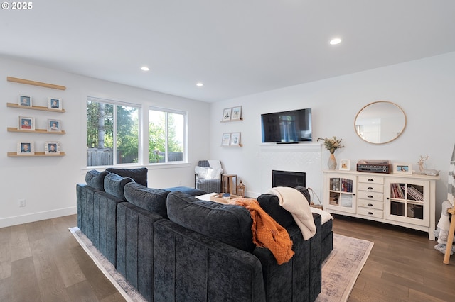 21773 SW Meadow Ter, Sherwood, OR 97140 - living room featuring a tile fireplace, dark wood-type flooring, and recessed lighting