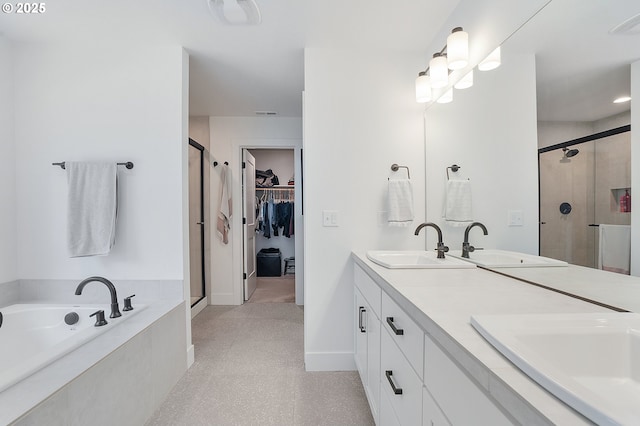 21773 SW Meadow Ter, Sherwood, OR 97140 - bathroom featuring a shower stall, double vanity, a garden tub, and a walk in closet