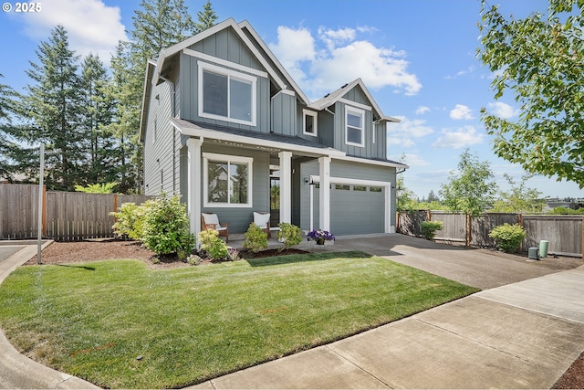 21773 SW Meadow Ter, Sherwood, OR 97140 - craftsman house featuring board and batten siding, covered porch, concrete driveway, and a garage