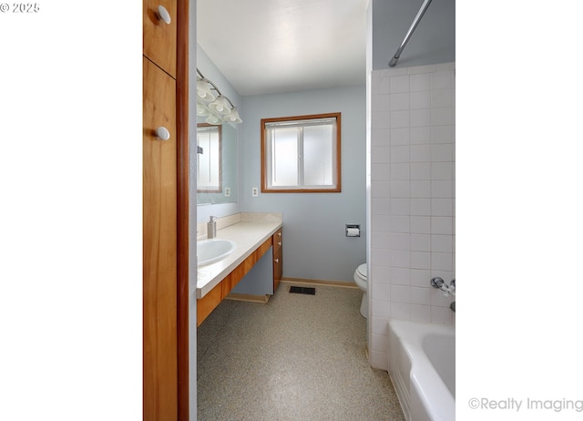 bathroom with visible vents, baseboards, toilet, and vanity