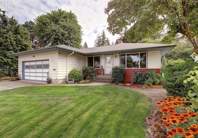 single story home with brick siding, a front lawn, a chimney, driveway, and an attached garage