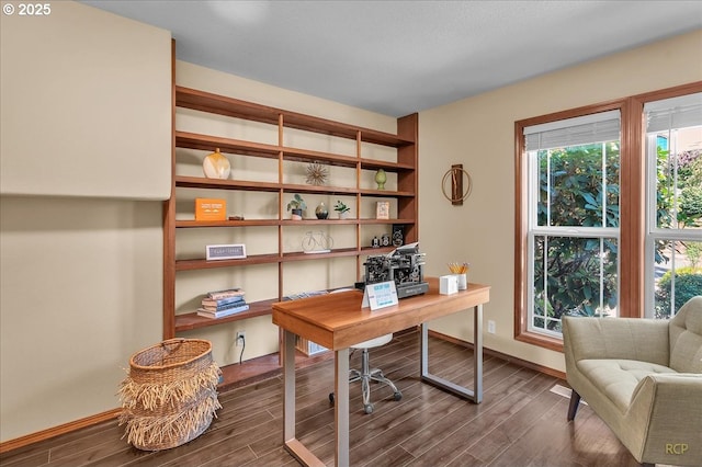 home office featuring baseboards and dark wood finished floors