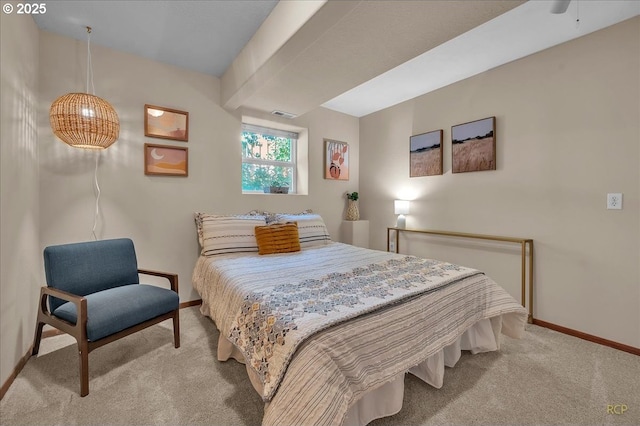 bedroom featuring carpet floors, visible vents, and baseboards