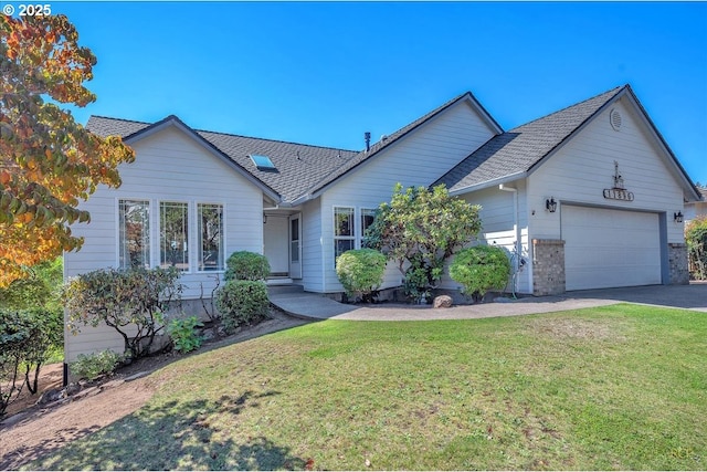 single story home with a front lawn, driveway, a shingled roof, and an attached garage