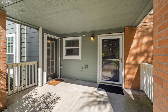 30406 SW Ruth St Unit 78, Wilsonville, OR 97070 - doorway to property featuring brick siding