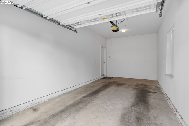 garage featuring a garage door opener