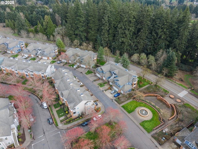 birds eye view of property with a residential view