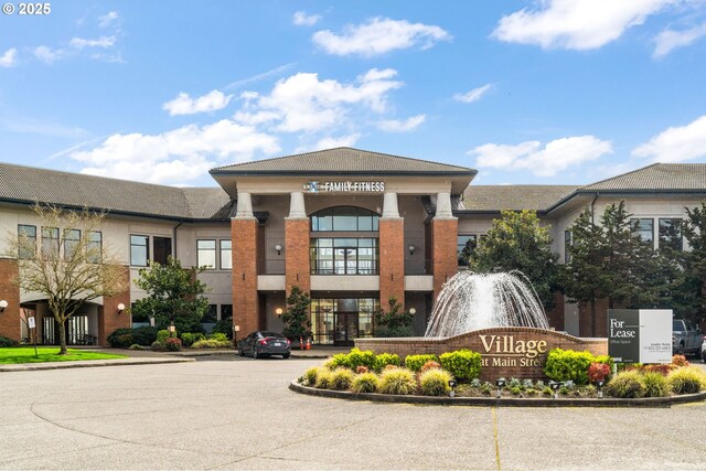 30406 SW Ruth St Unit 78, Wilsonville, OR 97070 - view of building exterior with uncovered parking