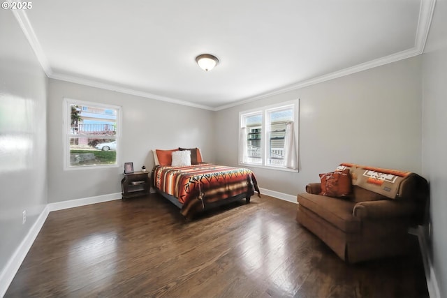 720 NW Johns Pl, Pendleton, OR 97801 - bedroom with crown molding, multiple windows, and dark wood-type flooring