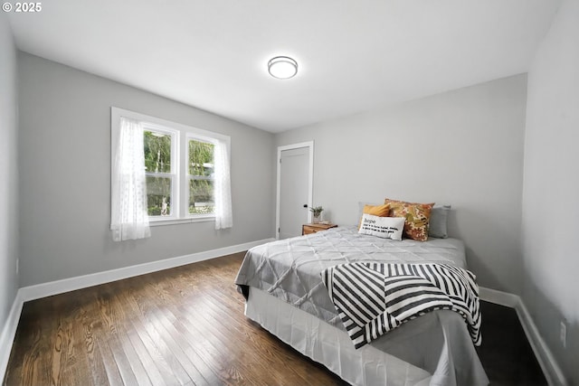720 NW Johns Pl, Pendleton, OR 97801 - bedroom featuring dark wood-style floors and baseboards