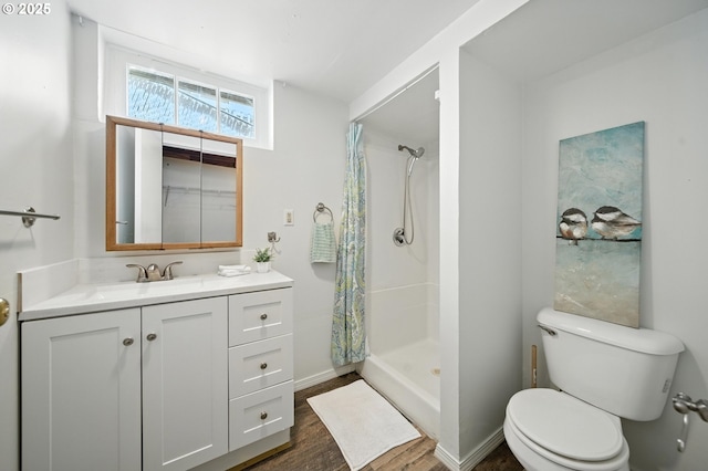 720 NW Johns Pl, Pendleton, OR 97801 - full bath with curtained shower, vanity, and wood finished floors