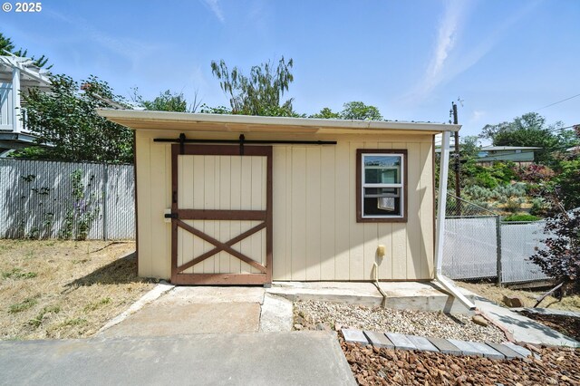 720 NW Johns Pl, Pendleton, OR 97801 - view of shed with a fenced backyard