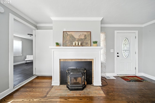 720 NW Johns Pl, Pendleton, OR 97801 - unfurnished living room featuring crown molding, a wood stove, and wood finished floors