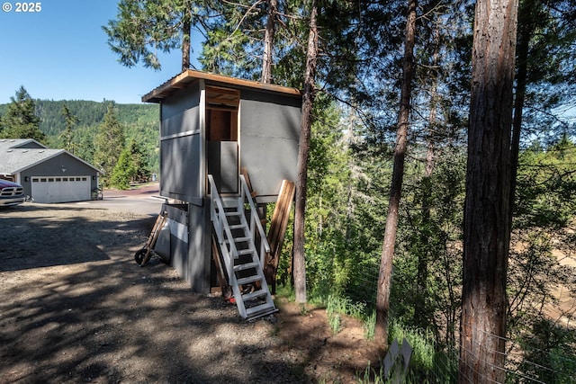 1950 Byron Creek Rd, Winston, OR 97496 - view of outbuilding featuring a wooded view