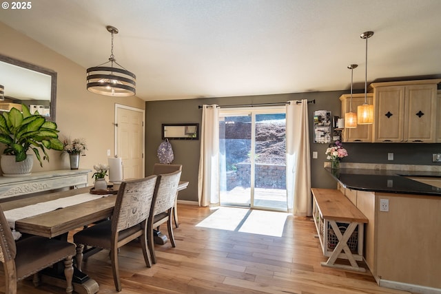 1950 Byron Creek Rd, Winston, OR 97496 - dining space featuring light wood finished floors and a chandelier