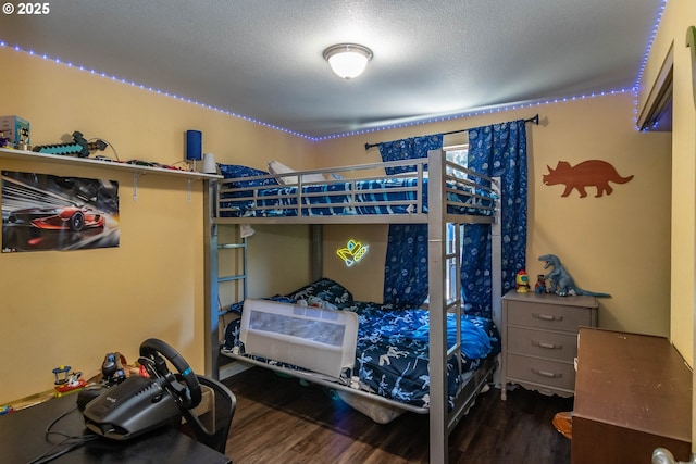 1950 Byron Creek Rd, Winston, OR 97496 - bedroom featuring wood finished floors and a textured ceiling