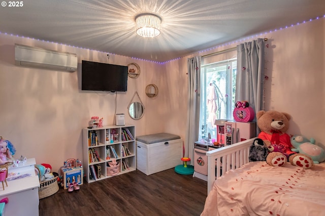 1950 Byron Creek Rd, Winston, OR 97496 - bedroom with an AC wall unit and wood finished floors