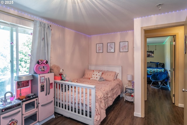 1950 Byron Creek Rd, Winston, OR 97496 - bedroom featuring dark wood-style flooring