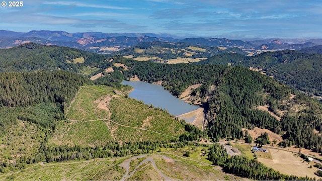 1950 Byron Creek Rd, Winston, OR 97496 - aerial view of property and surrounding area with a heavily wooded area and a water and mountain view