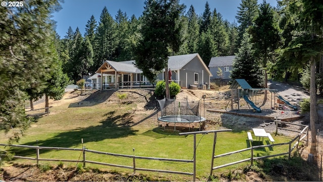 1950 Byron Creek Rd, Winston, OR 97496 - rear view of property featuring a trampoline and a playground
