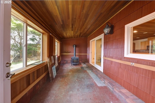 3162 Marine Dr, Astoria, OR 97103 - unfurnished sunroom featuring a wood stove