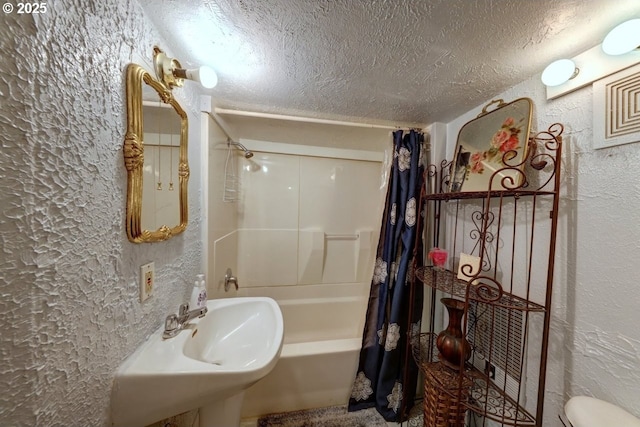 3162 Marine Dr, Astoria, OR 97103 - full bath with a textured wall, a textured ceiling, and shower / tub combo with curtain