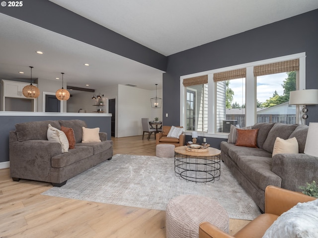 7882 SW Cinnabar, Wilsonville, OR 97070 - living room with light wood-type flooring and recessed lighting
