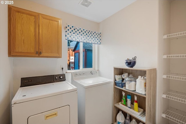 287 SW Oliver Ct, Dundee, OR 97115 - washroom featuring independent washer and dryer and cabinet space