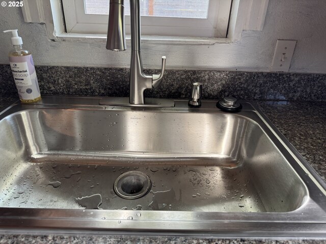 8305 SE Rhone St, Portland, OR 97266 - kitchen view of a sink and dark countertops