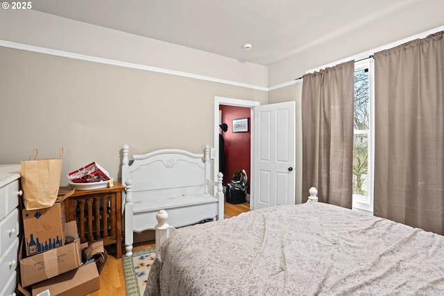 bedroom with light wood-type flooring