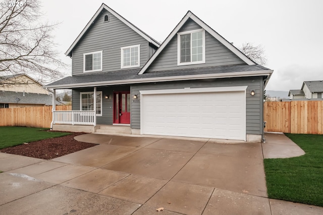 view of front of home with fence, a porch, concrete driveway, roof with shingles, and a garage