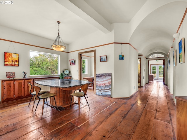 dining room with wood-type flooring
