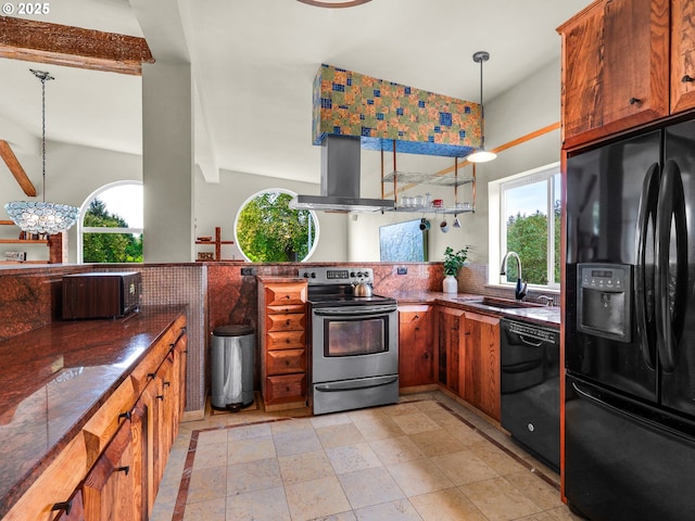 kitchen with a sink, range hood, black appliances, and a healthy amount of sunlight