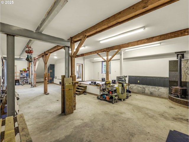 below grade area featuring a wood stove
