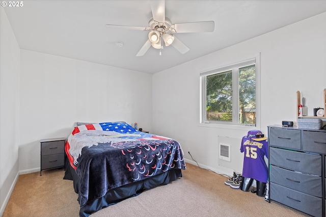 carpeted bedroom with ceiling fan