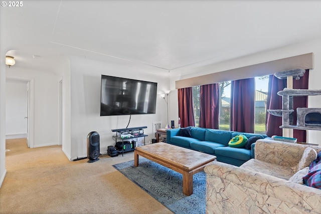 living room featuring light colored carpet