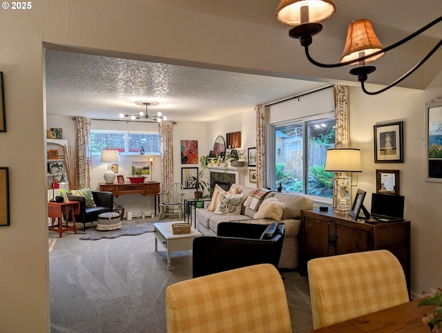 695 NW Towle Ave, Gresham, OR 97030 - carpeted living room featuring a chandelier and a textured ceiling