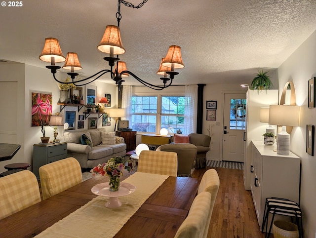 695 NW Towle Ave, Gresham, OR 97030 - dining room with a textured ceiling, wood finished floors, and a chandelier